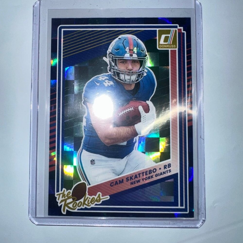 2025 Donruss CAM SKATTEBO The Rookies Blue Holo Prizm Checkerboard RC M/NM